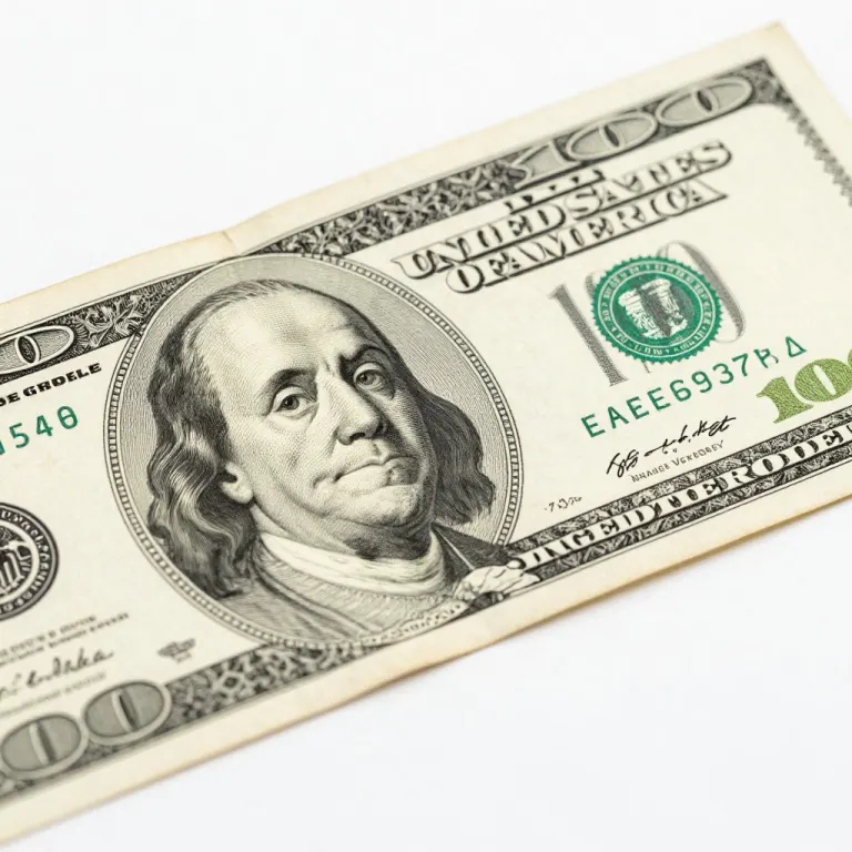 A close-up of a United States hundred dollar bill