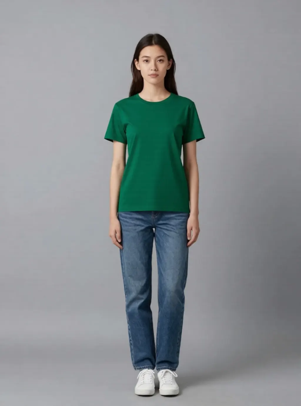 The same woman with the white t-shirt recoloured green, jeans unchanged